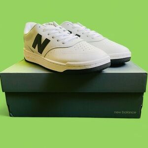New Balance Men's White Sneakers with Black Accents